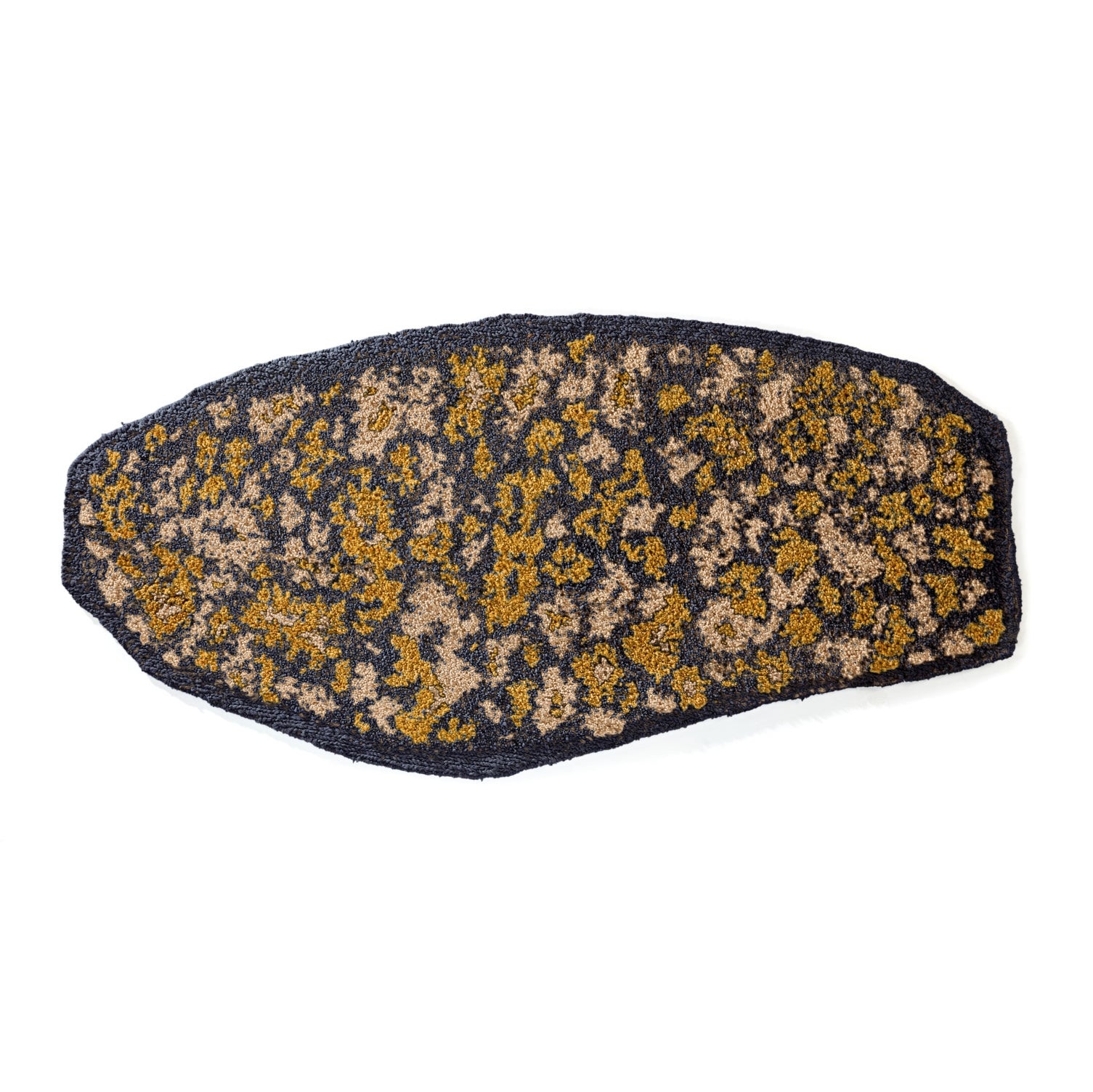 The Ames Zipa Rug by Ames features an oval shape with a textured dark navy background and irregular gold and tan patches, creating an abstract, organic look that's perfect as a statement piece.