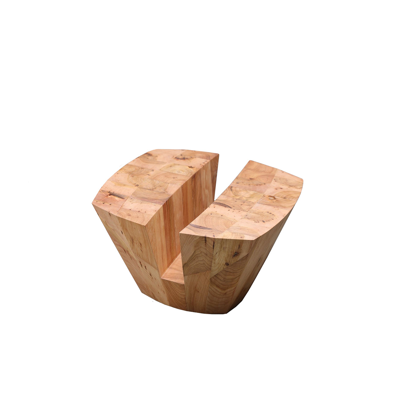 The KART Coffee Table by Artisan showcases a smooth, light wood finish with a geometric design and intricate grain patterns. Crafted from solid wood using natural oils, it features a unique form and is set against a plain white background.