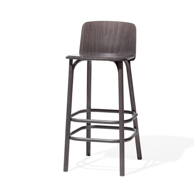 The Barstool Split by TON, designed by Arik Levy, is tall with a minimalist dark wood finish. It features a curved backrest, four legs, and two horizontal support rungs for stability, adding elegance to any setting.