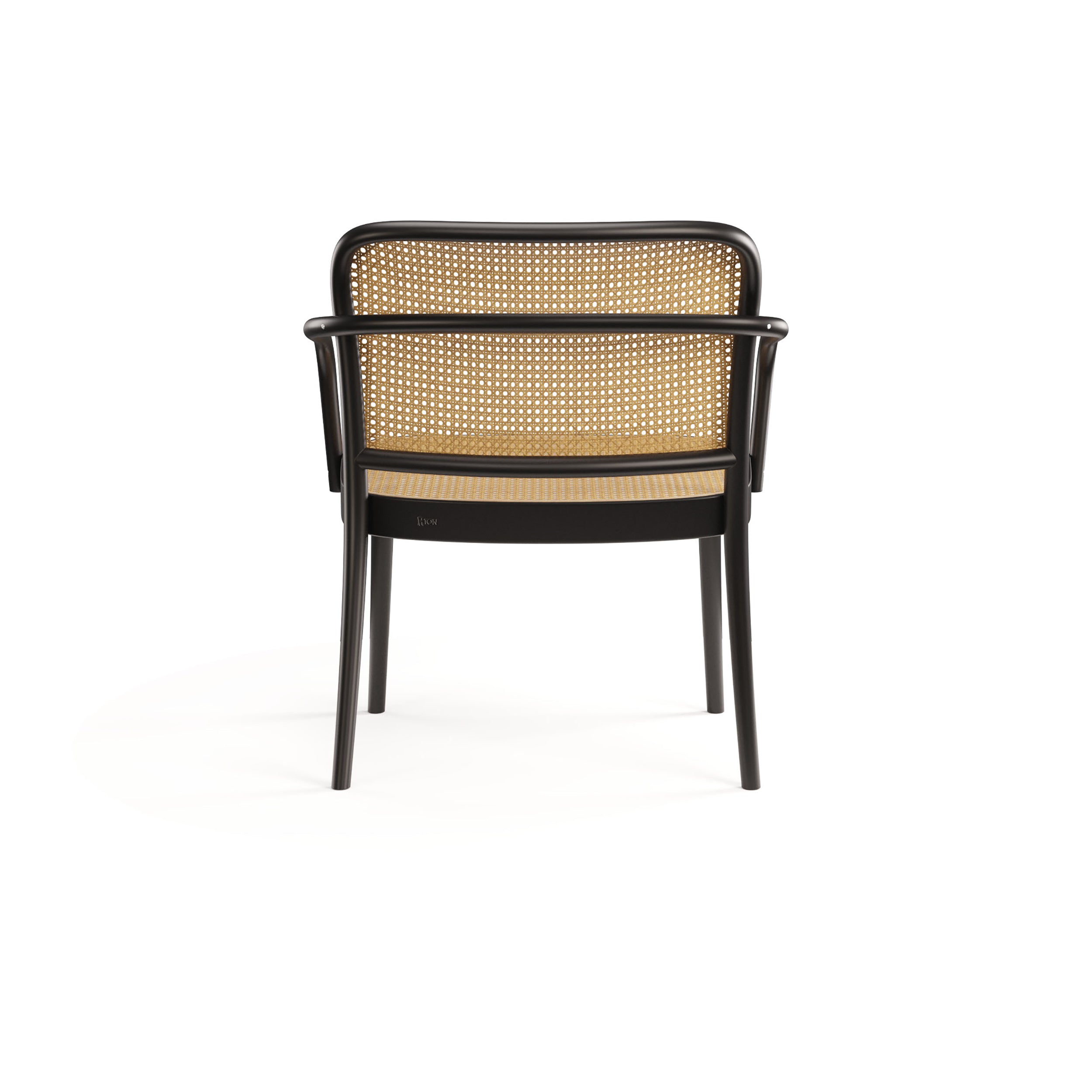 A back view of the Lounge Armchair 811 by TON, featuring black wood with intricate cane weaves on the seat and backrest. This four-legged chair has sleek armrests and a minimalist design, set against a white background.