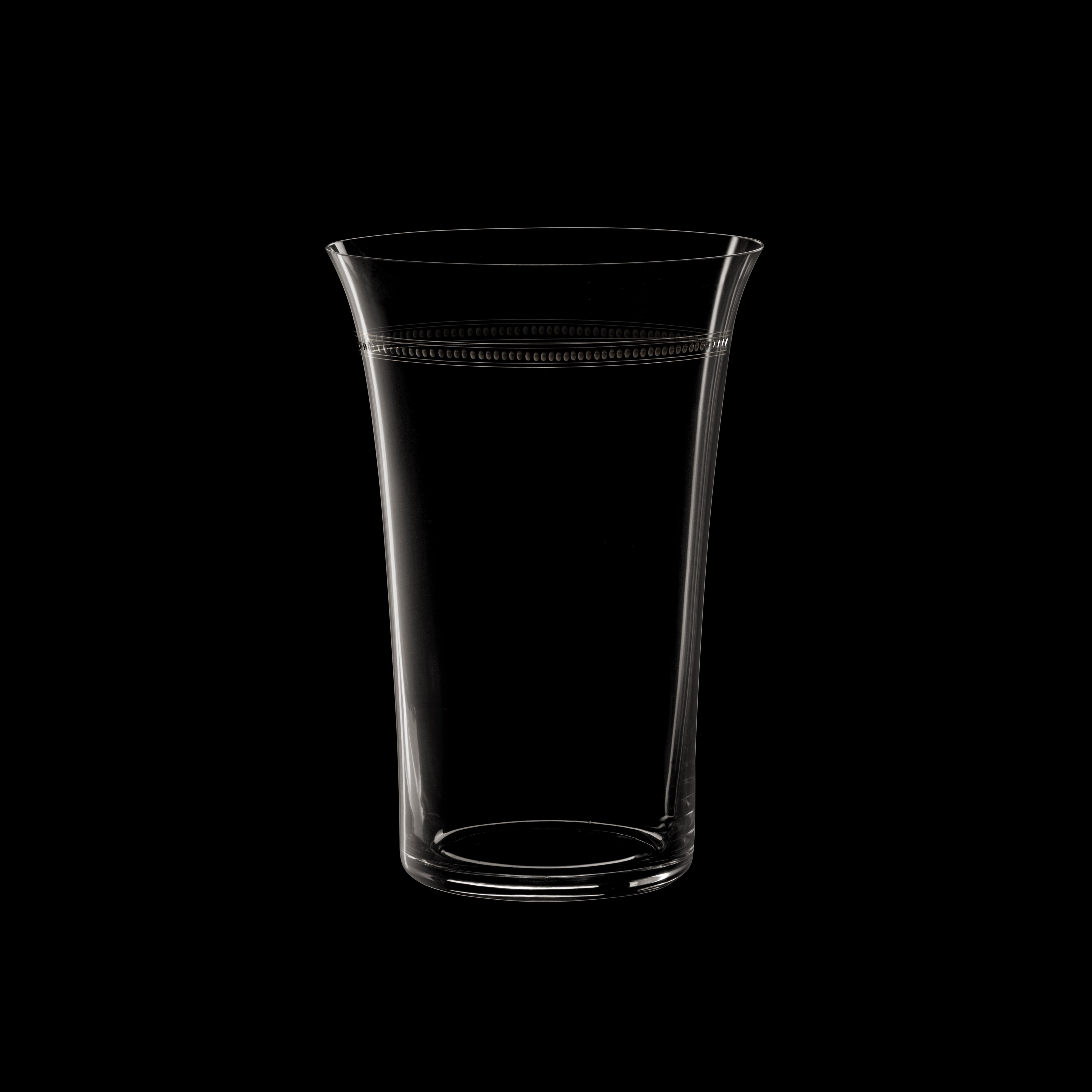 A clear, mouth-blown BV20 Flower Vase by Lobmeyr, featuring a wide rim and narrow base, is set against a solid black background, subtly reflecting light along its contours.