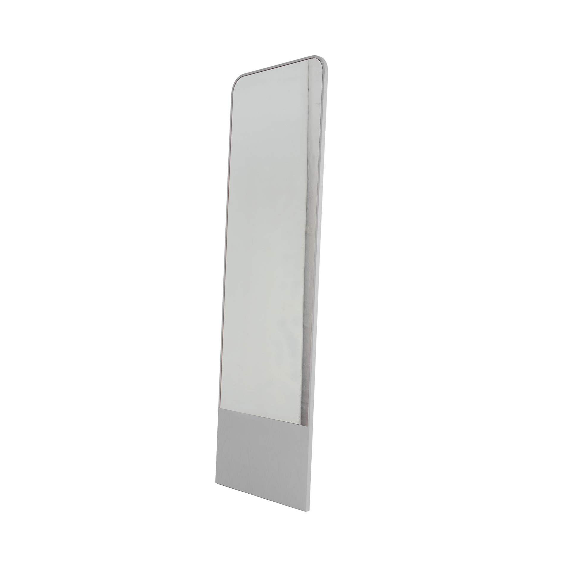 The Friedrich Mirror by Objekte unserer Tage is tall and rectangular, with a slim, sleek frame ideal for contemporary spaces. Its minimalist design features a slight backward tilt supported by a sturdy stand, giving it a modern look.