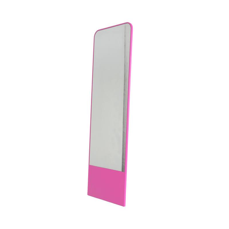 The Friedrich Mirror by Objekte unserer Tage is a full-length mirror with a sleek, minimalist design and a pink frame. Perfect for contemporary living spaces, its upright and slightly angled to the side.