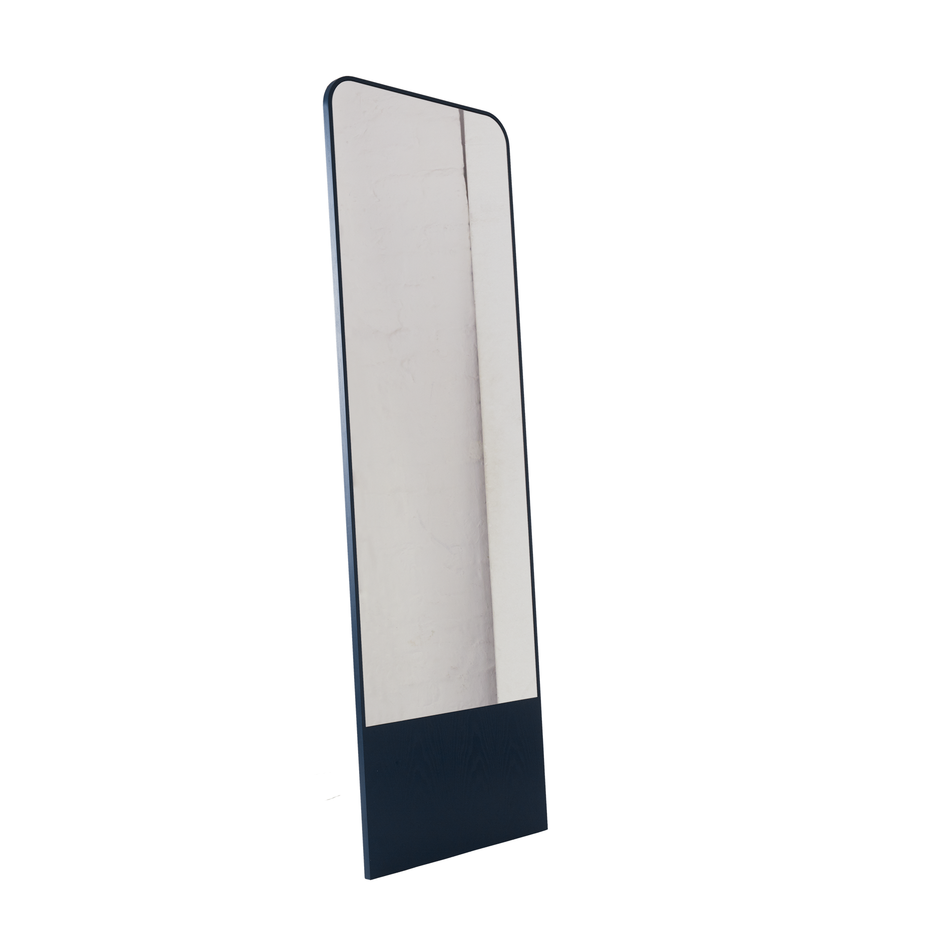 The Friedrich Mirror by Objekte unserer Tage is a tall, rectangular mirror with a full-length thin dark frame that stands upright. Its minimalist design features slightly rounded corners for a sleek look, ideal for contemporary spaces. It reflects a plain, lightly textured surface behind it.
