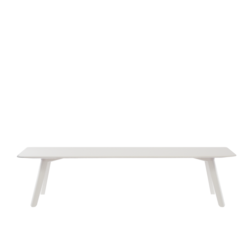 The Meyer Bench by Objekte unserer Tage is a minimalist piece made from solid ash, featuring a sleek rectangular seat and four angled legs. Its simple, unembellished design creates a modern look, centered against a plain white background.