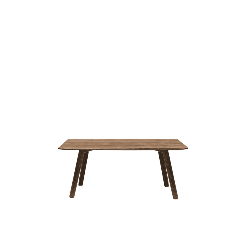 The Meyer Bench by Objekte unserer Tage is a minimalist piece crafted from solid ash, featuring a rectangular top and four angled legs. Its natural wood finish and simple yet elegant design are perfect for refined spaces, with the plain white background accentuating its graceful appearance.