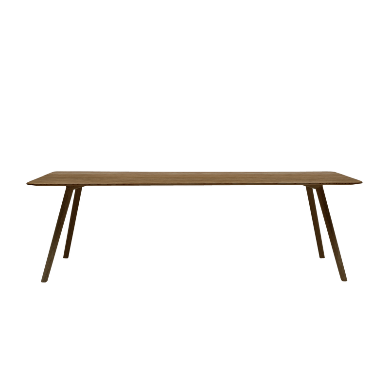 The Meyer Table by Objekte unserer Tage showcases a minimalist design with a flat rectangular top and inverted V shaped angled legs, made from solid ash with a smooth, natural finish that highlights its elegant simplicity.