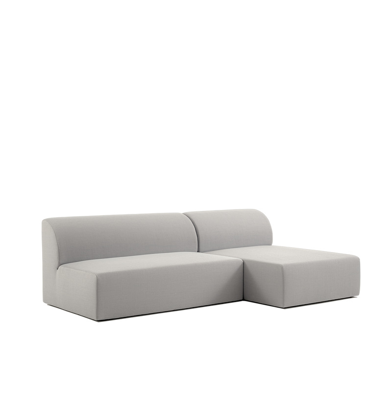 Experience the allure of German sensuality with the Objekte unserer Tage Weber Modular Sofa, featuring a modern gray design, clean lines, a two-seater, and right-side chaise. Its smooth upholstery offers comfort against a minimalist white backdrop.