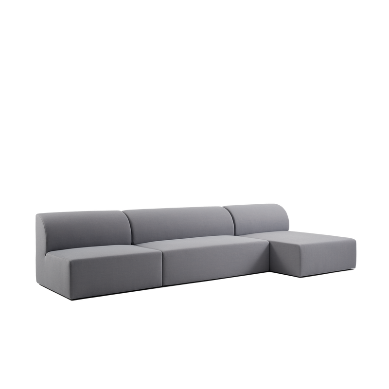 Presenting the Weber Modular Sofa by Objekte unserer Tage: a modern, minimalist gray sectional with German charm. This sustainable design includes three seating sections and a right-side chaise, highlighted against a plain white backdrop.