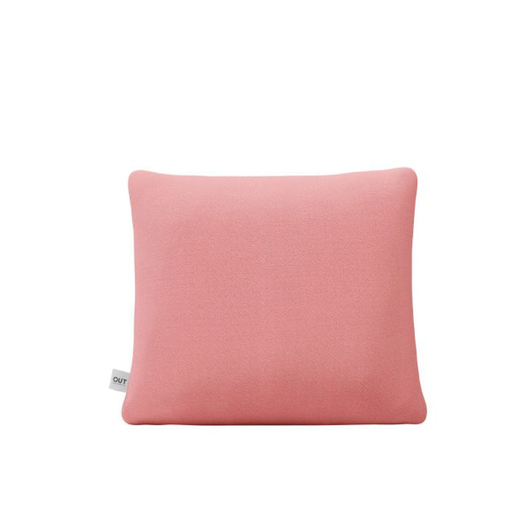 The light pink Weber Cushion by Objekte unserer Tage, featuring a small white side tag, complements the minimalist charm of a Weber sofa. Its subtle elegance against a plain white backdrop is reminiscent of refined Weber upholstery.