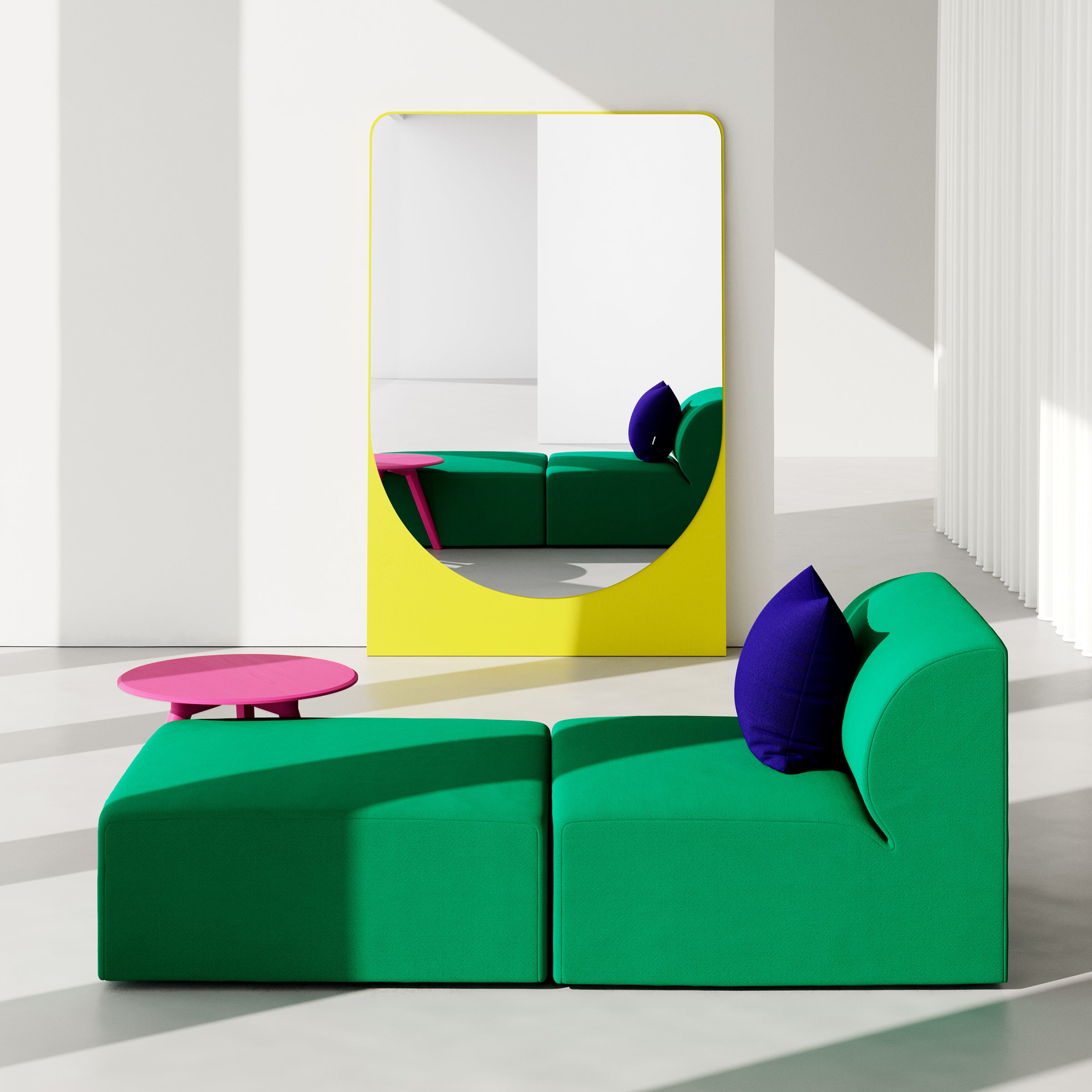 A contemporary room showcases Objekte unserer Tages Weber Modular Sofa in green, decorated with purple pillows. A pink coffee table enhances the decor, while a large yellow-framed mirror adds depth. The bright space, bathed in natural light, exudes an awareness of sustainability.