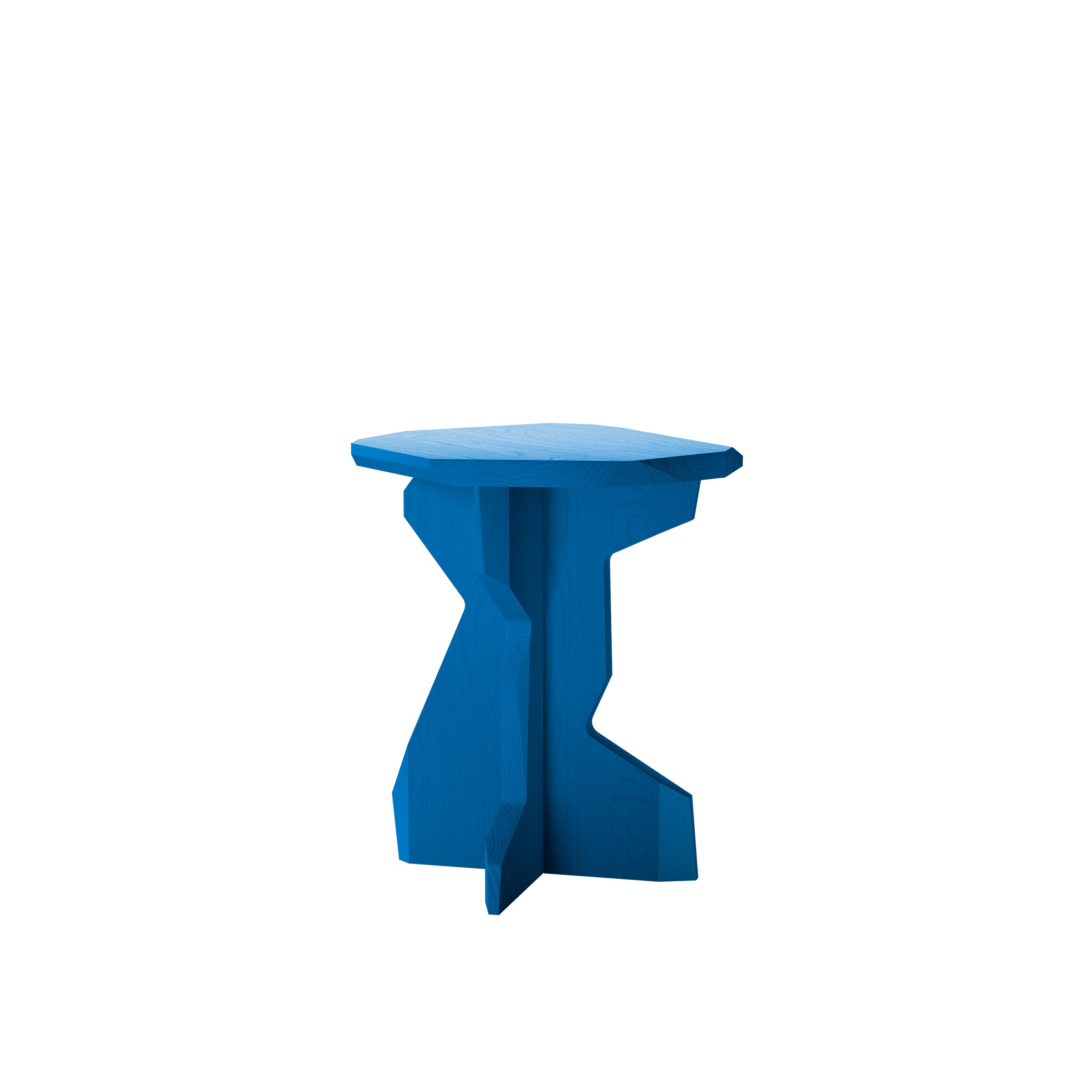 The FELS Sidetable by Objekte unserer Tage is a small, modern blue wooden side table with an abstract geometric shape, handcrafted from natural wood. It features a flat top and angular base, all showcased against a plain white background.