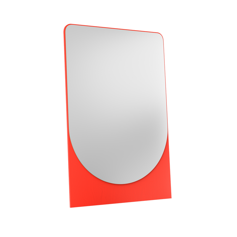 The Objekte unserer Tage FRIEDRICH MAX Mirror is a freestanding piece featuring a sculptural, rounded rectangular shape with light gray glass framed by bold red, leaning slightly against a black background.