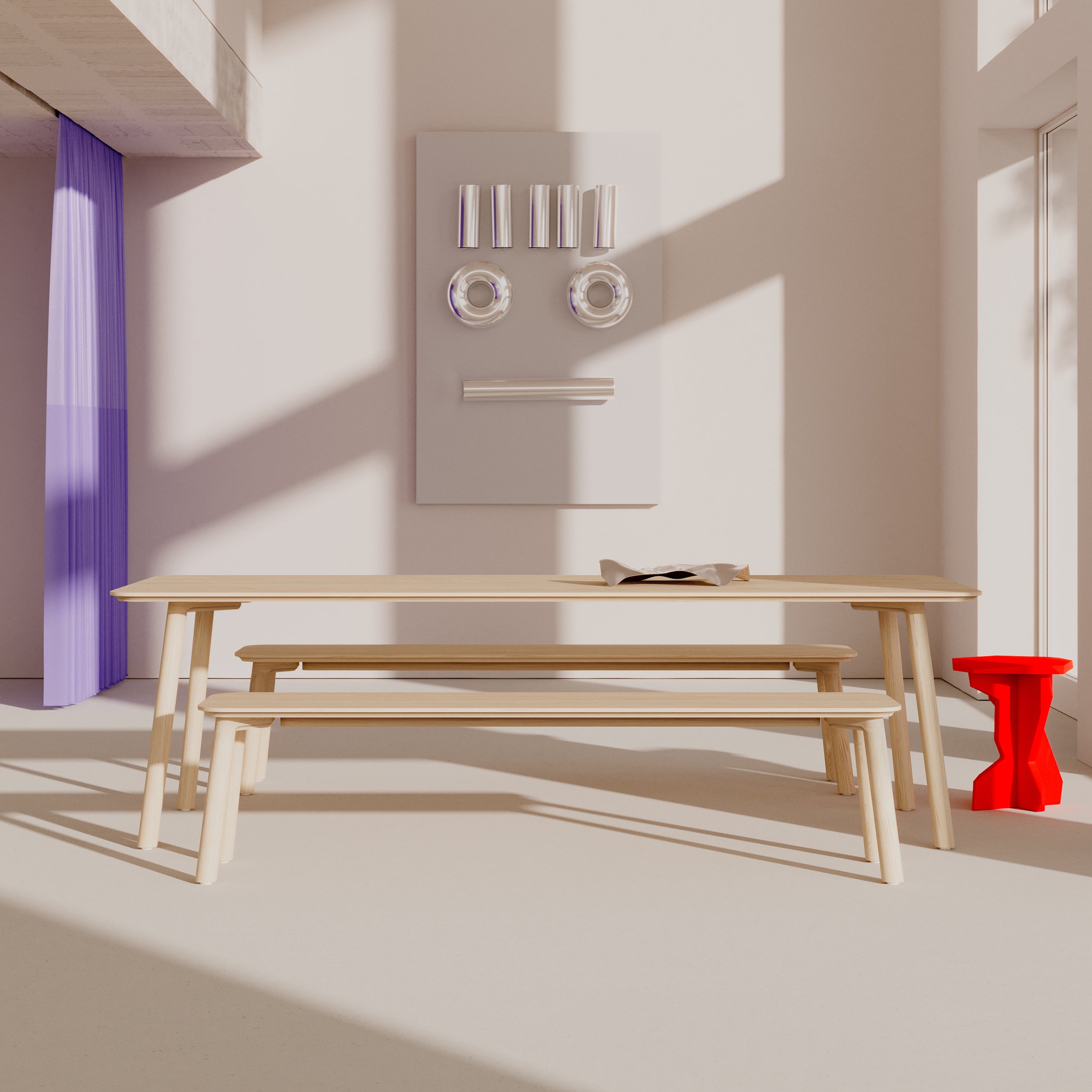 A modern dining room features the Meyer 23 Table and matching solid wood benches, emphasizing sustainability. Abstract wall art with circular and linear forms resembles a face, while a small red stool contrasts with neutral tones. Sunlight from Objekte unserer Tage casts gentle shadows across the room.