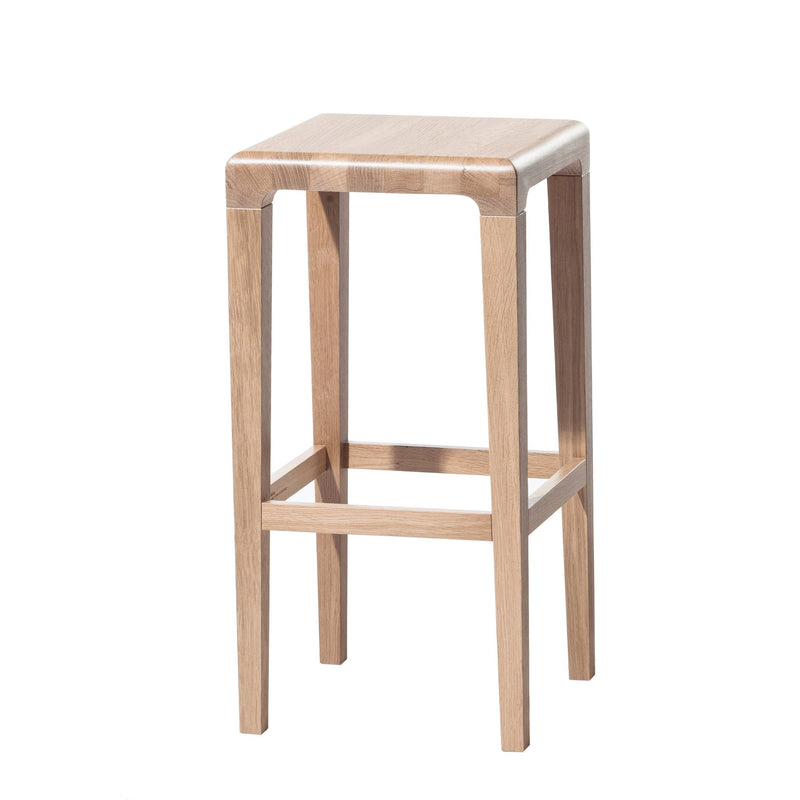 The Barstool Rioja - Sale by TON features a square seat and four sturdy legs with a natural wood finish, exuding simple, modern charm. Horizontal support bars enhance its stability, making it ideal for contemporary spaces.