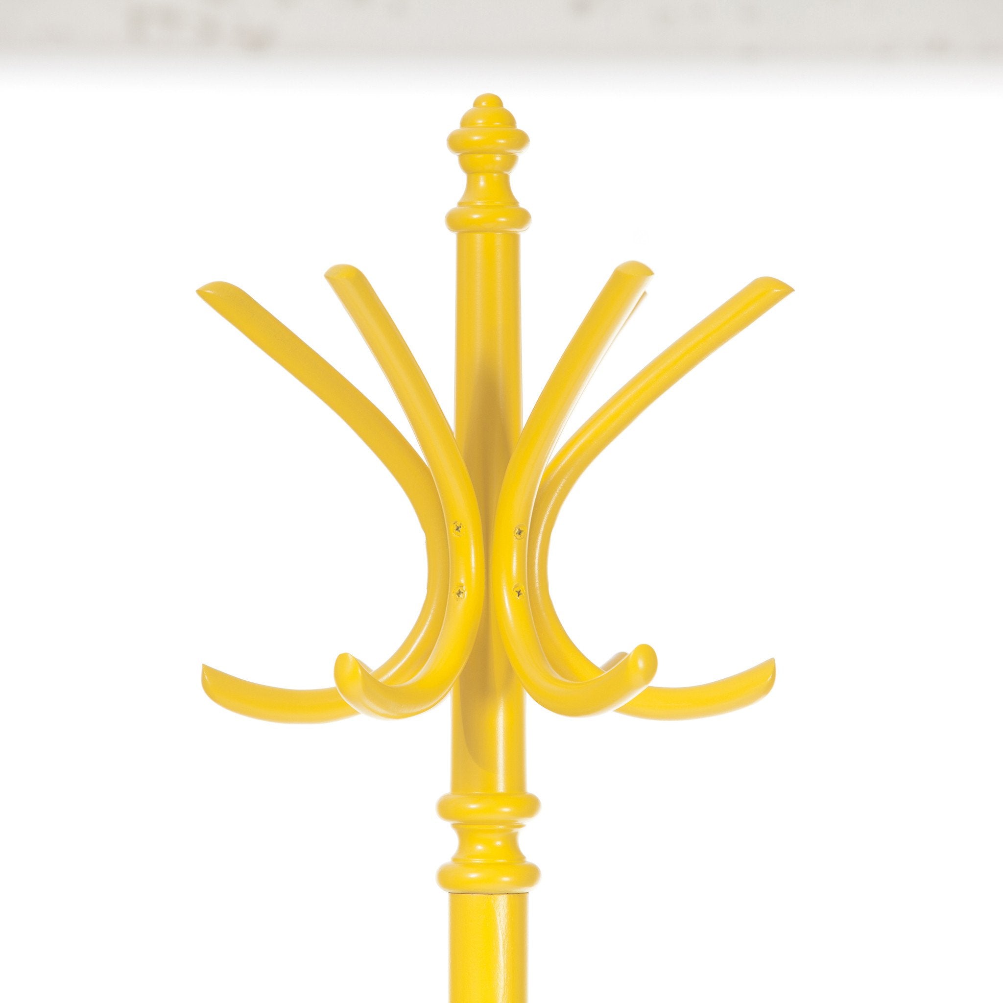 The Stand by 020 from TON is a yellow coat rack featuring six manually bent curved hooks and a decorative top finial, designed for universal use, shown against a white background.