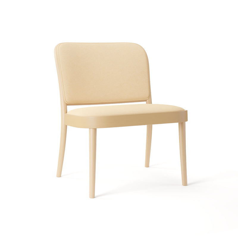 The Loungechair 811 by TON, designed by Claesson Koivisto Rune, is a minimalist wooden armchair with a light beige seat and slightly curved backrest. Its simple straight legs make it perfect for modern relaxation spaces.